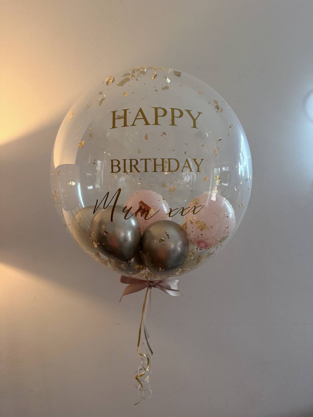 Gold flake bubble balloon with a personalised message for Mum's birthday