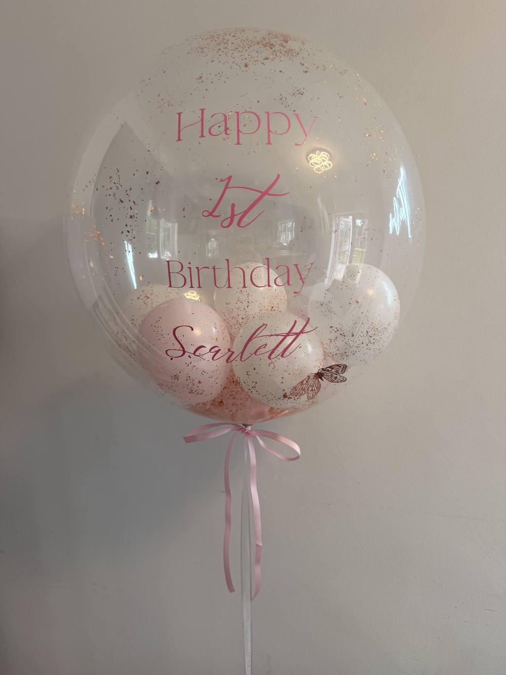 Rose gold confetti bubble balloon for a first birthday, personalised Scarlett