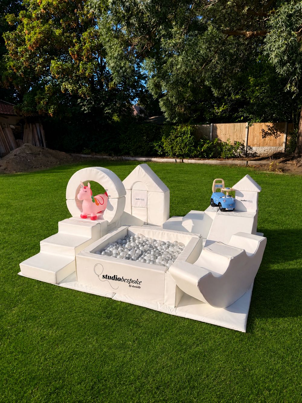 Luxury soft play package with ball pit, hoop, slide and castle blocks, branded Studio Bespoke